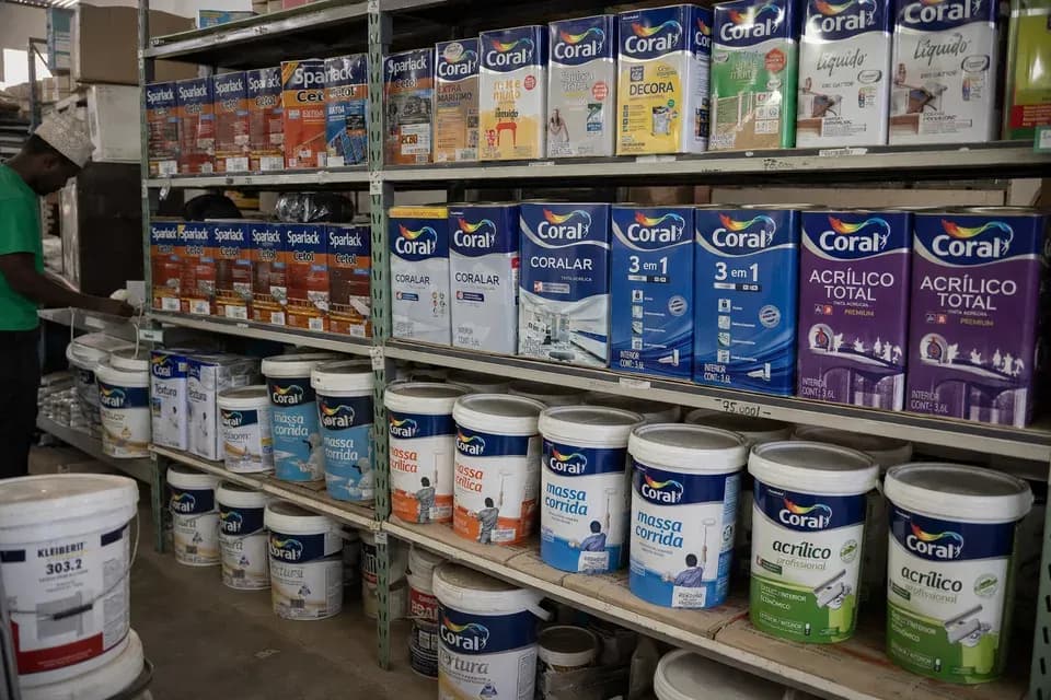 Paint buckets and tins on supply store shelves