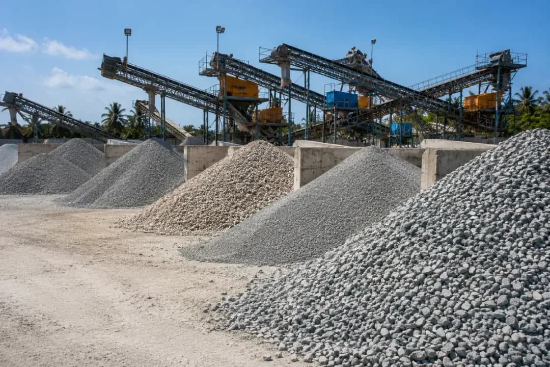 Aggregate Yard Quality Control Zanzibar Aggregate yard with graded crushed stone stockpiles for concrete batching in Zanzibar